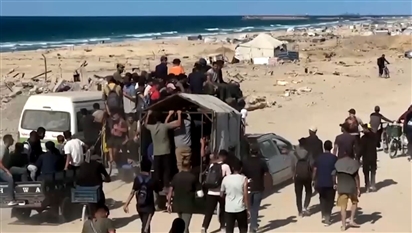 Dòng người Palestine khăn gói trở về quê nhà tan hoang ở Thành phố Gaza