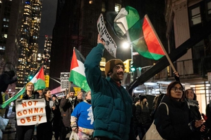 Sốc nặng vì đặc vụ Mỹ bắn vào mặt người nhập cư