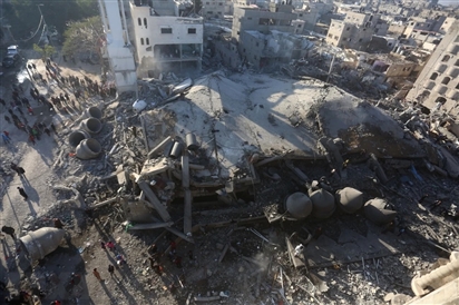 Hình ảnh về vụ oanh kích của Israel làm hàng trăm người thương vong tại Gaza