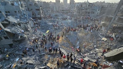 Thêm trại tị nạn ở Gaza bị không kích, hơn 50 người thiệt mạng