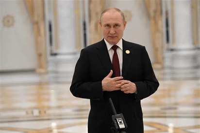 Ông Putin điềm tĩnh, tự tin tái xuất trên trường quốc tế