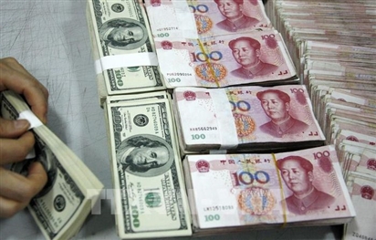 Trung Quốc: Dự trữ ngoại tệ gia tăng trong bối cảnh đồng USD yếu