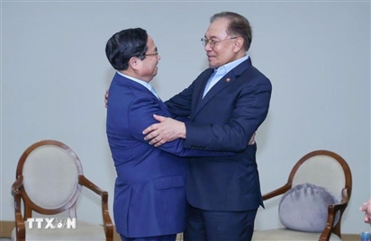 Thủ tướng Phạm Minh Chính gặp Thủ tướng Malaysia nhân Hội nghị BRICS